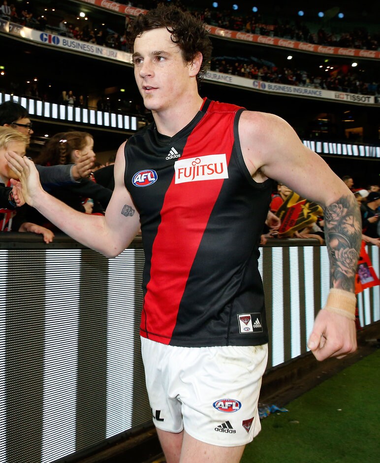AFL 2015 Rd 23 - Collingwood v Essendon MELBOURNE, AUSTRALIA - SEPTEMBER 6: Jake Carlisle of the Bombers thanks fans after the 2015 AFL round 23 match between the Collingwood Magpies and the Essendon Bombers at the Melbourne Cricket Ground, Melbourne, Australia on September 6, 2015. (Photo by Adam Trafford/AFL Media)